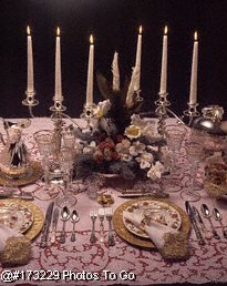 Fancy silver and gold table setting with